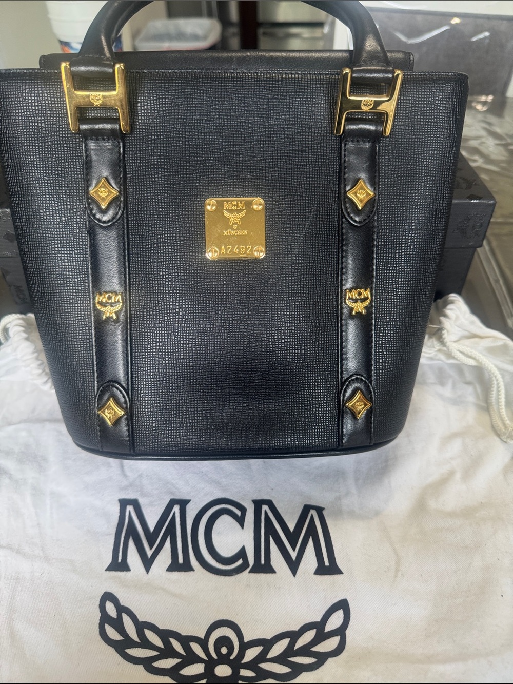 MCM Black Leather Top-Handle Tote with Gold Plaque and Hardware